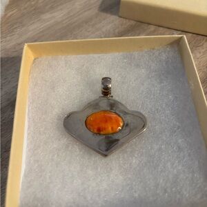 Sterling Silver Pendant with Orange Cabochon Accent